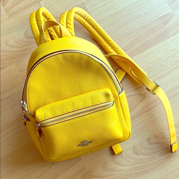 yellow coach backpack